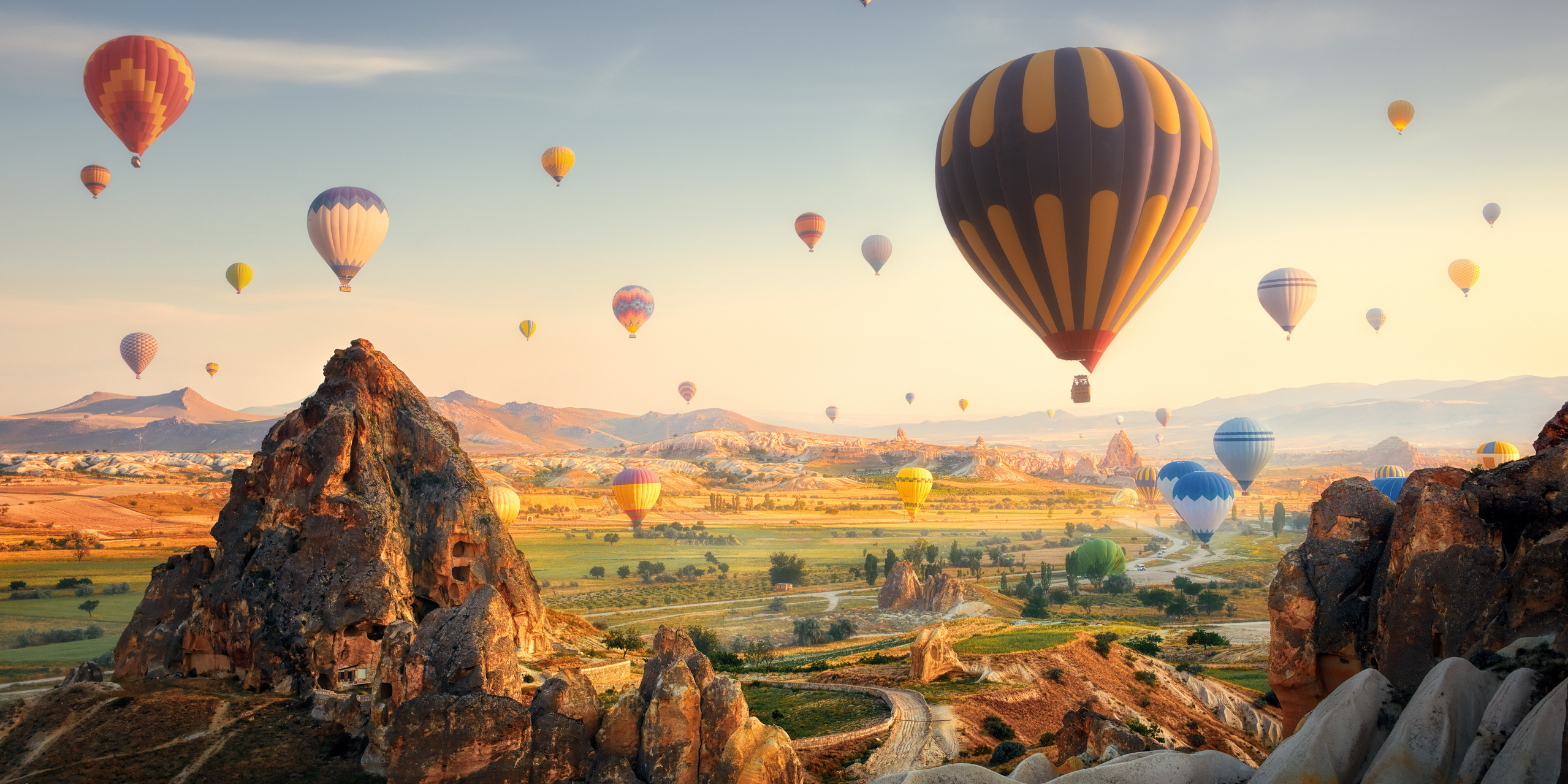 Hot air balloons flying over spectacular Cappadocia.Turkey